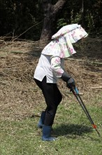 Woman gardening in Hong Kong