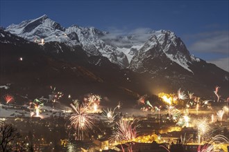 New Year's Eve fireworks over Garmisch-Partenkirchen, view of Alpspitze and Zugspitze, Wetterstein