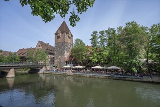 Historic debtor's tower, next to it a garden pub on the Pegnitz, Nuremberg, Middle Franconia,