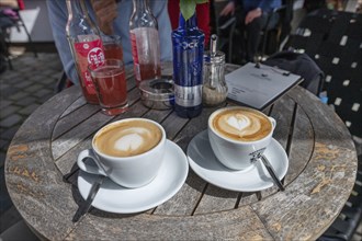 Two cappuccinos on a restaurant table, Bavaria, Germany, Europe