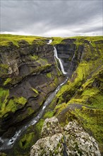 River and waterfalls at a canyon with green moss, Haifoss and Granni waterfall at a canyon, Fossá í