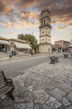 Great typical Greek town and buildings. Mediterranean cityscape in the evening at sunset on