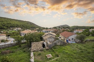 Great typical Greek town and buildings. Mediterranean cityscape in the evening at sunset on