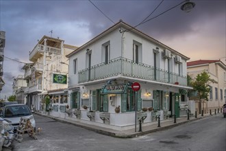 Great typical Greek town and buildings. Mediterranean cityscape in the evening at sunset on