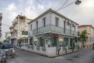 Great typical Greek town and buildings. Mediterranean cityscape in the evening at sunset on