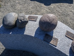 Exhibition of different rock types moved by glacial streams, beach Molen, west of Larvik, Norway,