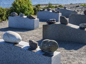 Exhibition of different rock types moved by glacial streams, beach Molen, west of Larvik, Norway,