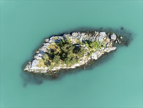 Top-down aerial view of island in the Lustrafjord, inner branch of the Sognefjord, near Dalsoren,