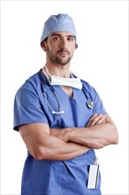 Young male surgeon with scrubs and a stethoscope, isolated in white