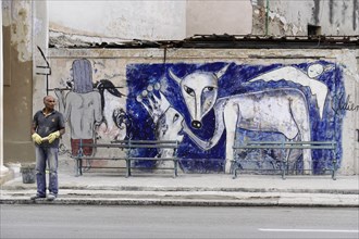 Havana, Cuba, Central America, Cubans in front of a large graffiti, Central America