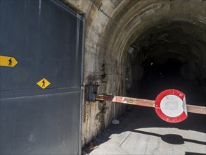 Hiking path along eastern shore of lake Emosson inside a tunnel, Lac de Emosson, Switzerland,