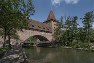 Historic chain footbridge, 1824, over the Pegnitz and Fronveste and Schlayer Tower around 1490,