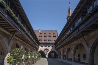 Inner courtyard of the historic Heilig-Geist-Spital, Nuremberg, Middle Franconia, Bavaria, Germany,