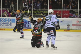 Ice hockey player Jordan Owens cheers