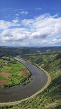 River loop of the Saar. The river winds through the valley and is surrounded by green hills and