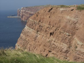 Red cliffs on the coast with a view of the sea, helgoland, germany