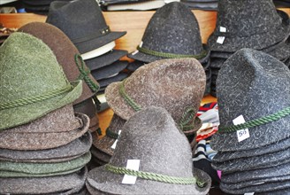 Many felt hats on a traditional bavarian market