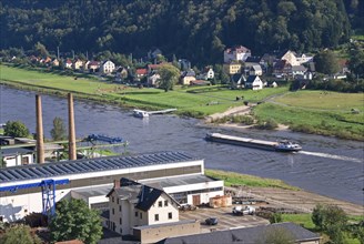 Freght ship on elbe river in saxony, germany