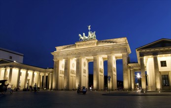Berlin brandenburg gate at night with blue sky