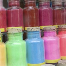 Various color pigments in a window display