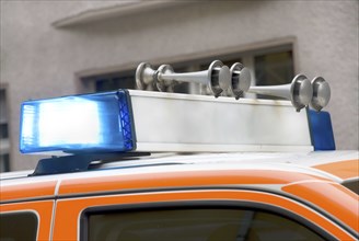 Roof of a german emergency car with blue light