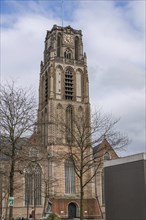 Gothic church with high tower and historical details, Rotterdam, Netherlands