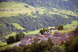 Modern Alpine village of traditional construction