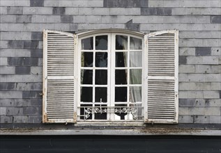 Transom window with shutters in Honfleur Window with shutters in France