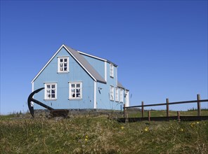 Blue house in Sandgerdi in the west of Iceland