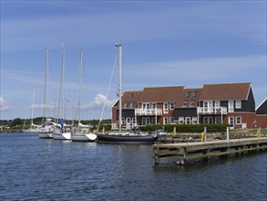 Klintholm Havn is a fishing village and popular holiday resort on the south coast of Mon, an island