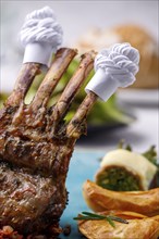 Lamb ribs with frills and salad