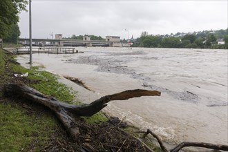 Symbolic image extreme weather, global warming, climate change, flood, washed up wood, barrage on