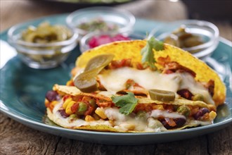 Mexican tacos baked with cheese