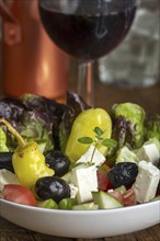 Greek salad with red wine
