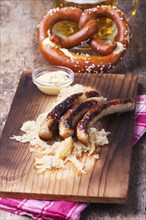 Grilled sausages with sauerkraut