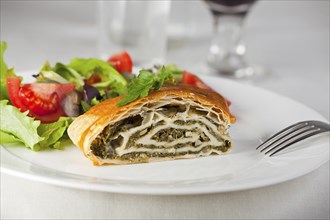 Spinach strudel with fresh salad