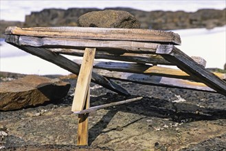 Wooden trap for catching Arctic foxes in Arctic, Svalbard