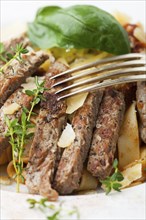 Beef on pasta