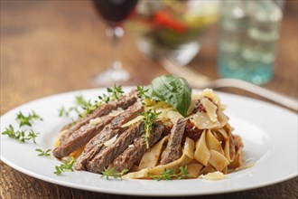 Beef on pasta