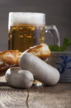 Bavarian veal sausage with pretzel and beer