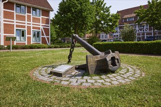 Historic anchor in front of Jork town hall, Altes Land, Stade district, Lower Saxony, Germany,