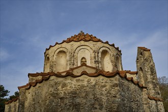 Close-up of the dome and roof of a historic church with a blue sky in the background, Byzantine