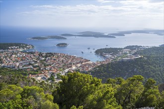 View of the old town centre of Hvar, behind Pakleni or Paklinski Islands, Dalmatia, Croatia, Europe