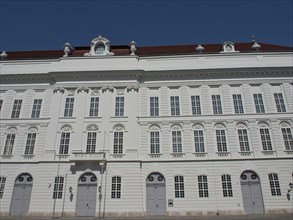 Historic building with white façade and symmetrically arranged windows, Vienna, Austria, Europe