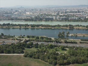 Expansive view of a city with several rivers and islands in the foreground, Vienna, Austria, Europe