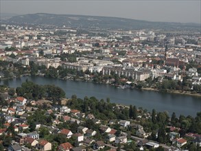 View of a city with many houses and a river, surrounded by hills, Vienna, Austria, Europe