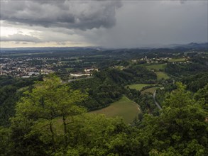 Storm clouds over Leibnitz, Seggau Castle, Frauenberg pilgrimage church in the background, view