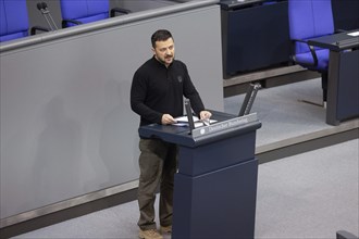 Volodymyr Zelensky (President of Ukraine) delivers a speech at a special session of the German