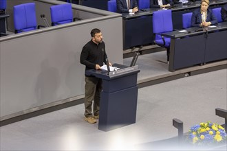 Volodymyr Zelensky (President of Ukraine) delivers a speech at a special session of the German