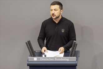 Volodymyr Zelensky (President of Ukraine) delivers a speech at a special session of the German